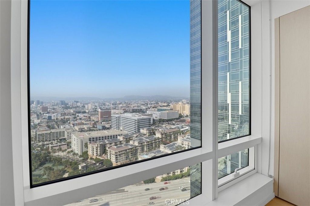 877 Francisco Street, Unit 3102 Los Angeles, CA 90017 - Photo 19 of 36 a view of a city from a balcony