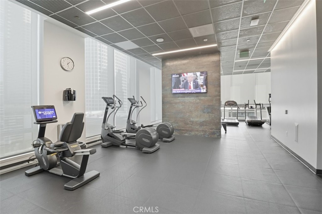 877 Francisco Street, Unit 3102 Los Angeles, CA 90017 - Photo 24 of 36 a view of a room with gym equipment