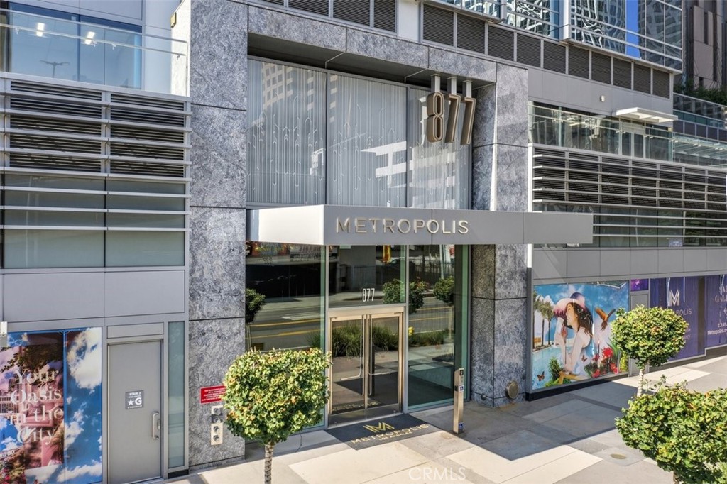877 Francisco Street, Unit 3102 Los Angeles, CA 90017 - Photo 3 of 36 a view of a potted flower in front of a building