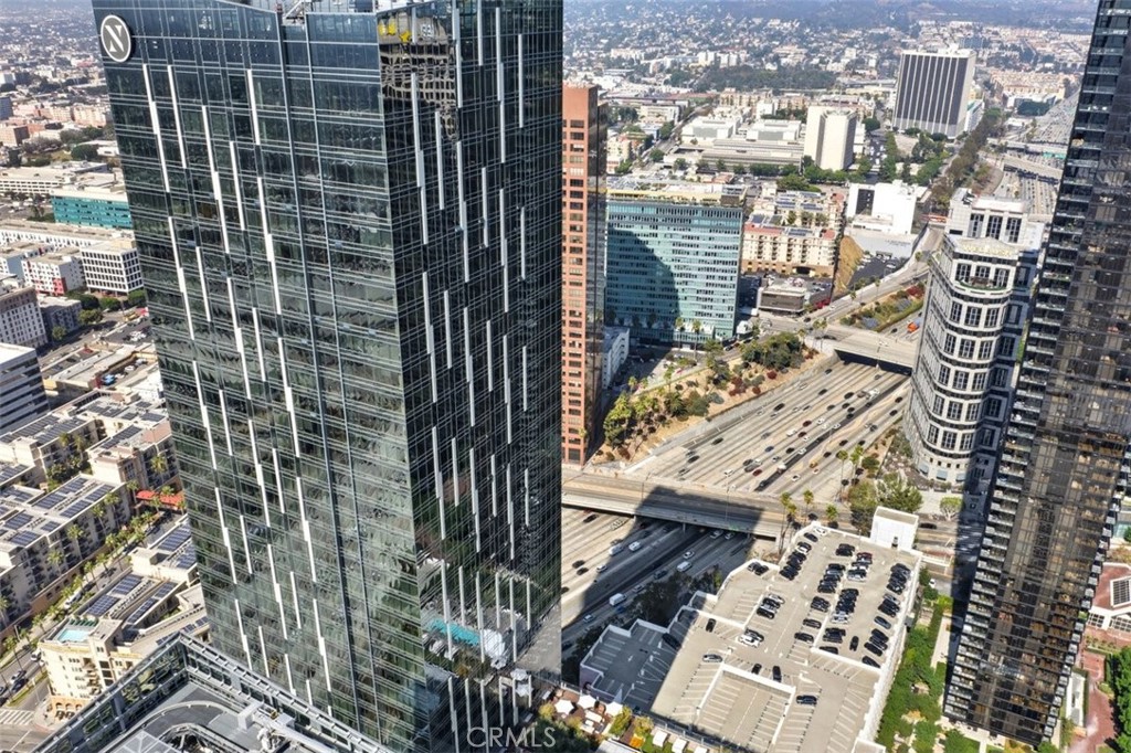 877 Francisco Street, Unit 3102 Los Angeles, CA 90017 - Photo 5 of 36 a view of a balcony with a tree