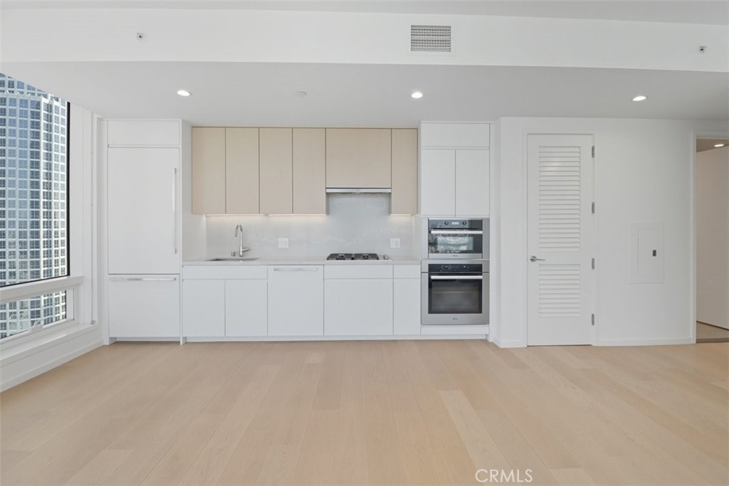 877 Francisco Street, Unit 3102 Los Angeles, CA 90017 - Photo 10 of 36 a view of kitchen with cabinets and stainless steel appliances