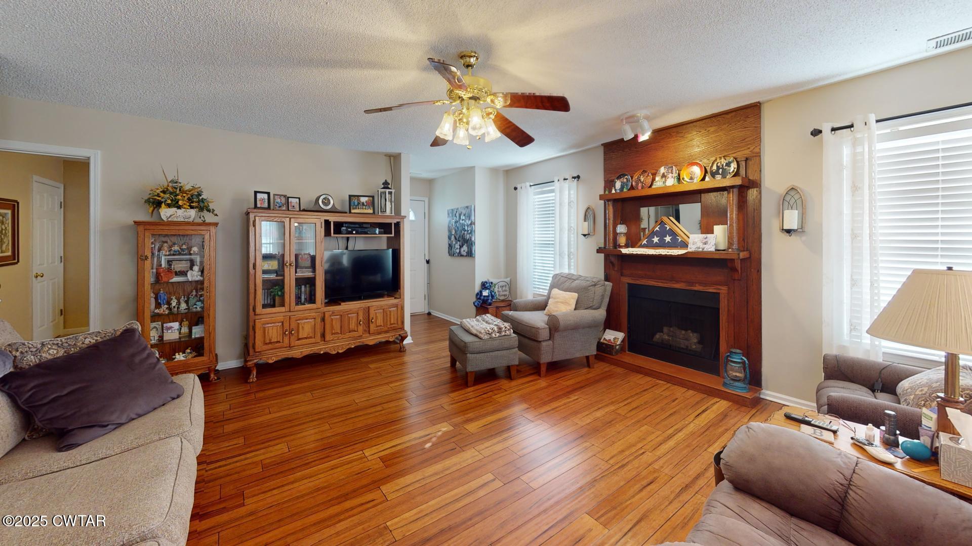 4836 Lightfoot Luckett Road Ripley, TN 38063 - Photo 11 of 23 a living room with furniture and a fireplace