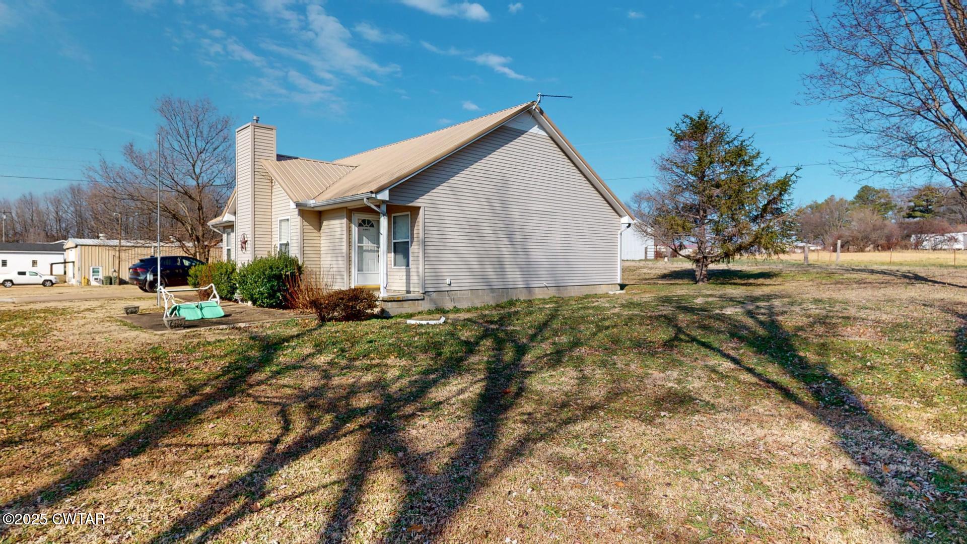 4836 Lightfoot Luckett Road Ripley, TN 38063 - Photo 3 of 23 a view of backyard of house
