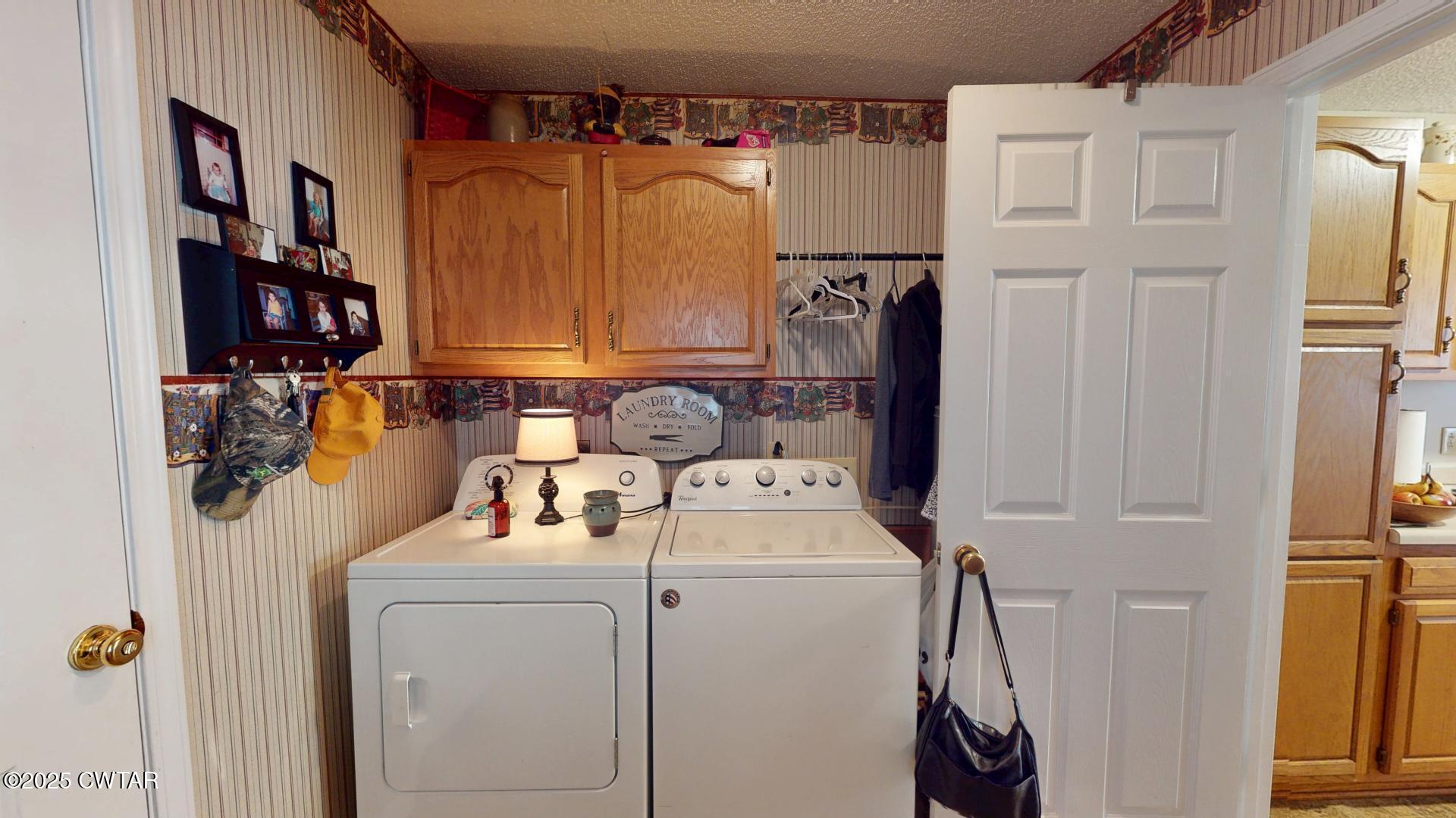 4836 Lightfoot Luckett Road Ripley, TN 38063 - Photo 7 of 23 a view of storage and utility room with washer and dryer
