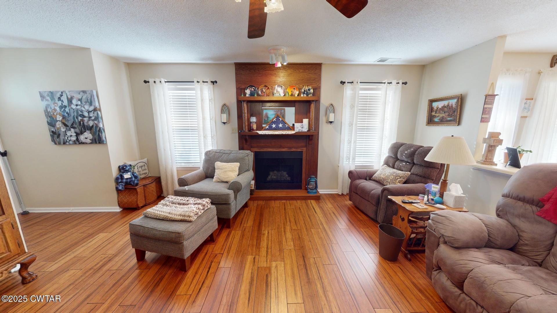 4836 Lightfoot Luckett Road Ripley, TN 38063 - Photo 8 of 23 a living room with furniture and a fireplace