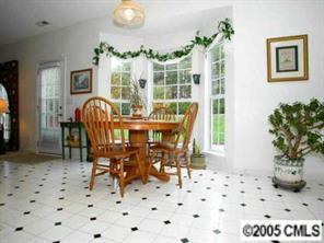 523 North Portman Lane Fort Mill, SC 29708 - Photo 3 of 8 a view of a dining room with furniture and chandelier