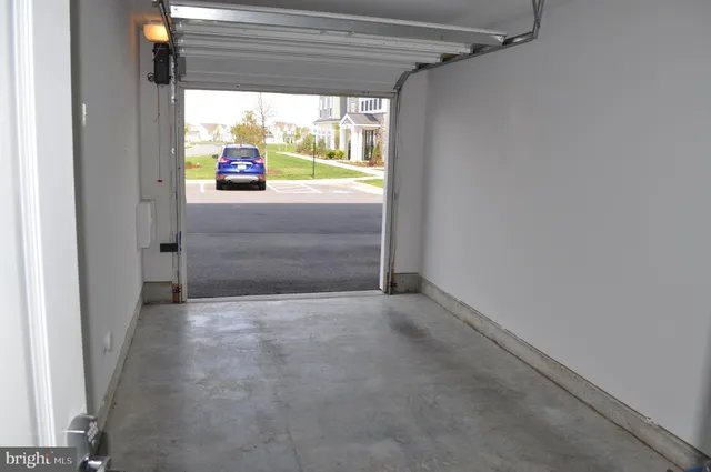 a living room with granite countertop furniture and a fireplace