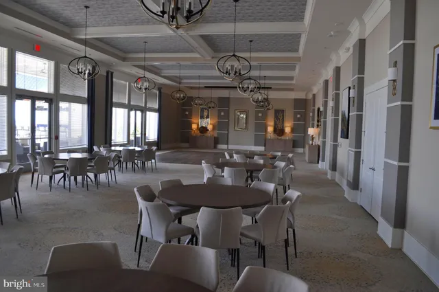 a view of a lake with houses in the back