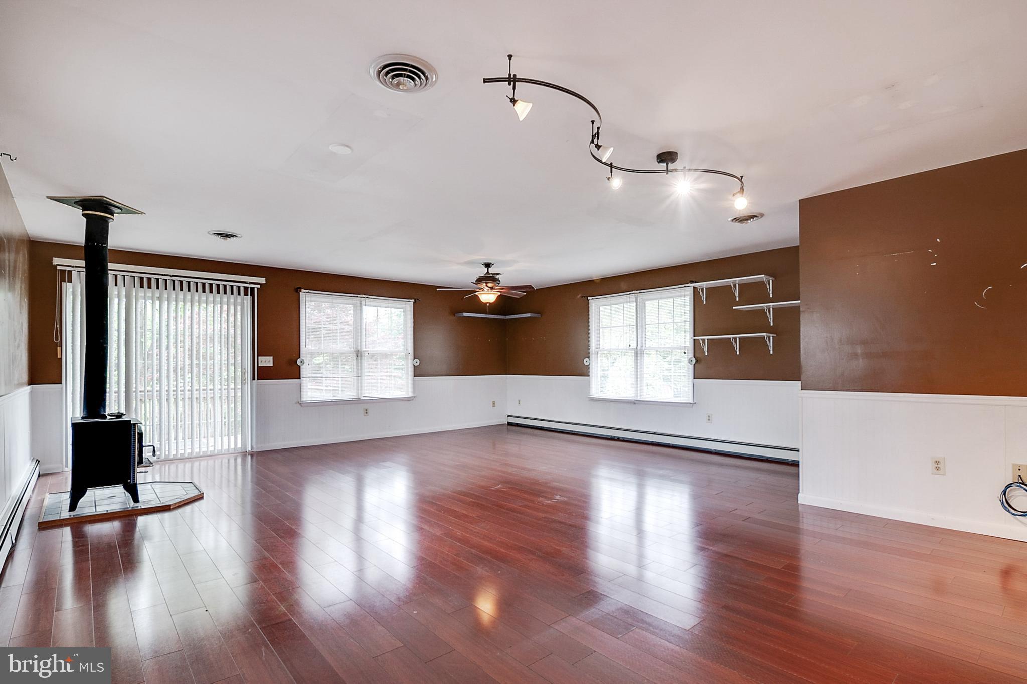 2149 Bethel Road Finksburg, MD 21048 - Photo 11 of 25 Large Great Room with Free standing Wood Stove