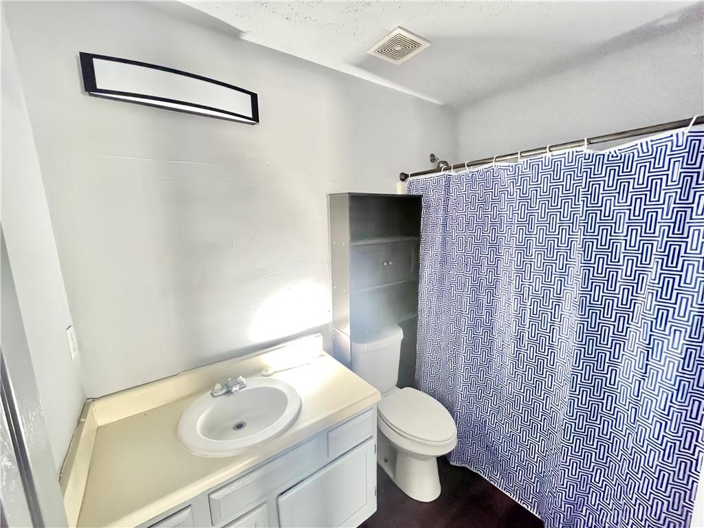 3622 Shepherds Path Decatur, GA 30034 - Photo 20 of 28 a bathroom with a sink toilet and shower