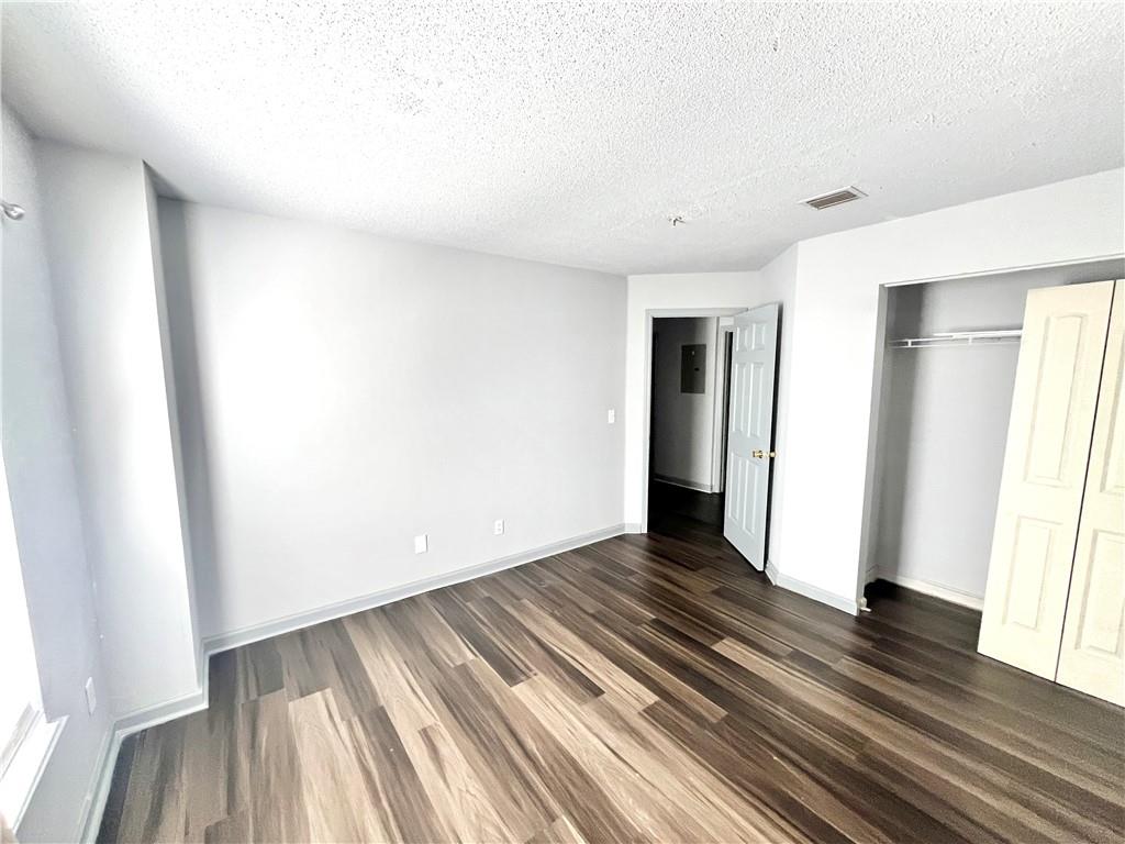 3622 Shepherds Path Decatur, GA 30034 - Photo 22 of 28 a view of an empty room with wooden floor and a window