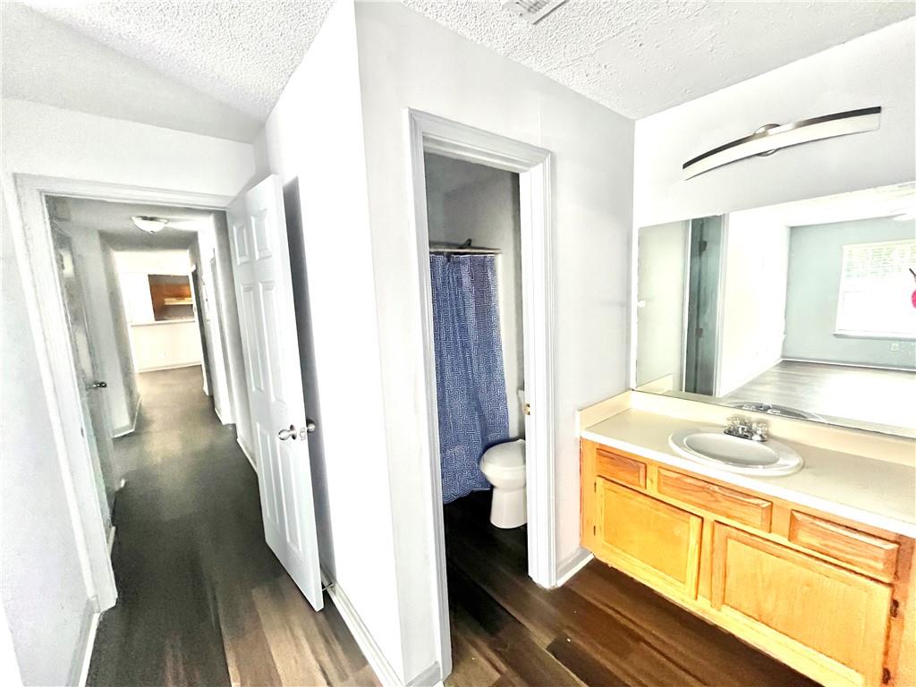 3622 Shepherds Path Decatur, GA 30034 - Photo 23 of 28 a bathroom with a sink a mirror a toilet and a shower