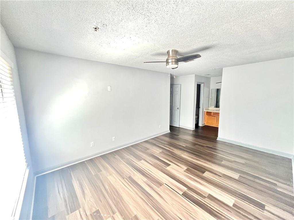 3622 Shepherds Path Decatur, GA 30034 - Photo 25 of 28 a view of an empty room with wooden floor and a window