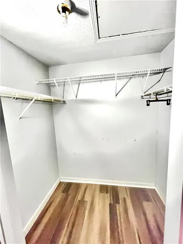 a view of a room with racks on the wall