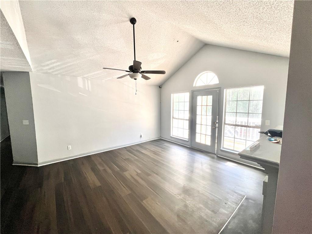 3622 Shepherds Path Decatur, GA 30034 - Photo 4 of 28 a view of an empty room with a window and wooden floor