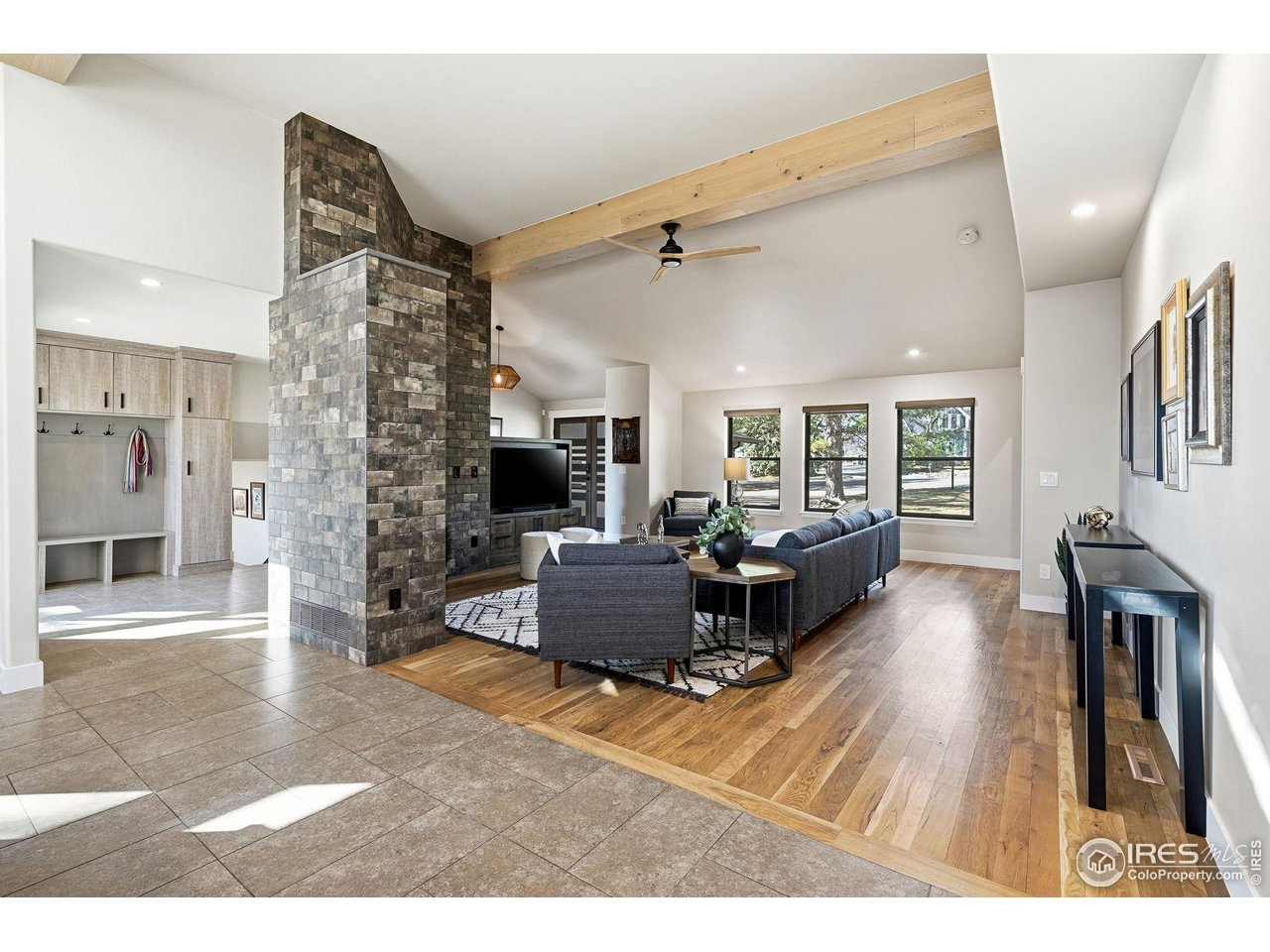 12212 Cash Road Longmont, CO 80503 - Photo 10 of 47 a living room with furniture and a wooden floor