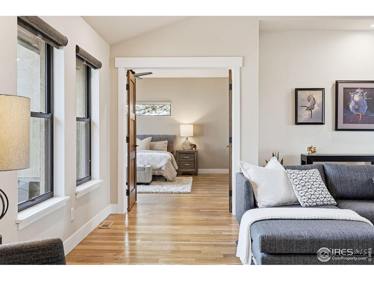 12212 Cash Road Longmont, CO 80503 - Photo 17 of 47 a living room with furniture and a mirror