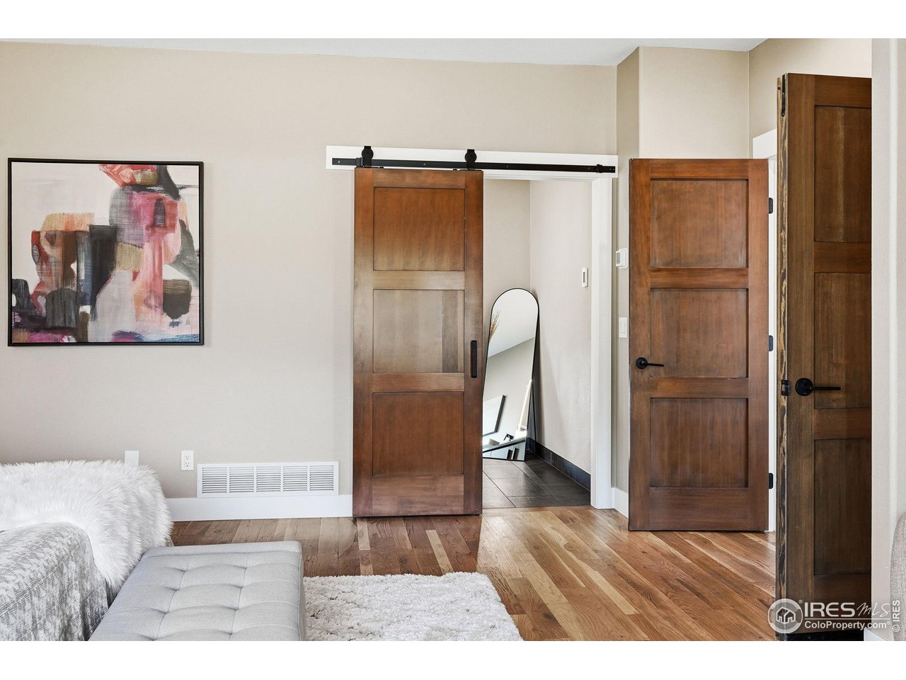 12212 Cash Road Longmont, CO 80503 - Photo 19 of 47 a bathroom with a glass shower door