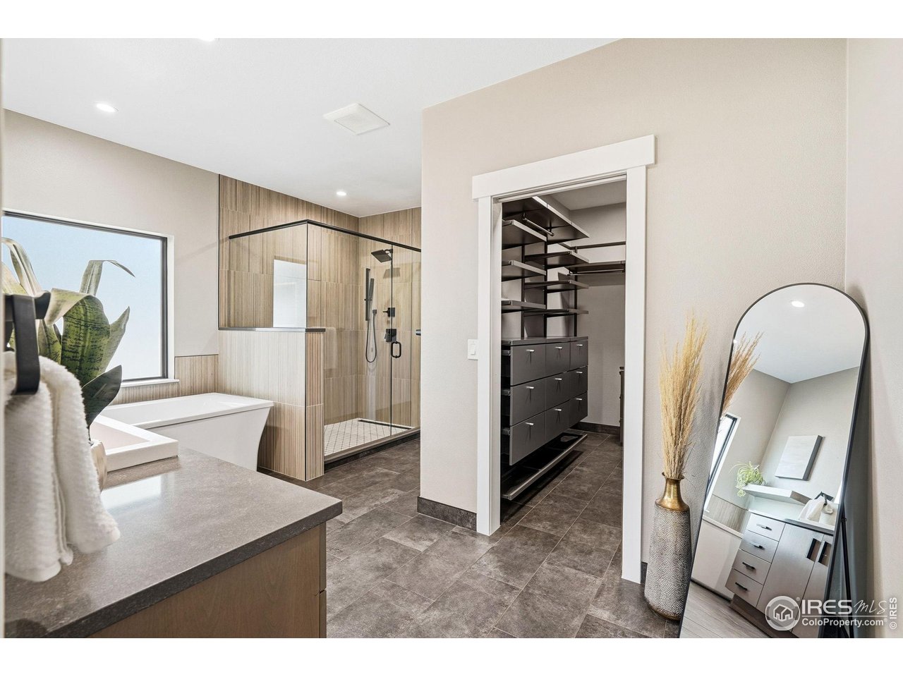 12212 Cash Road Longmont, CO 80503 - Photo 20 of 47 a living room with furniture and a wooden floor