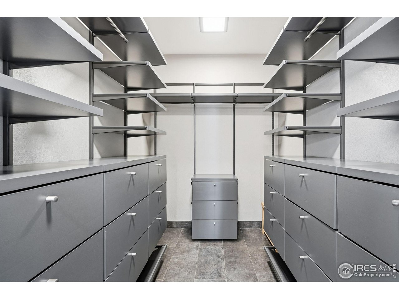 12212 Cash Road Longmont, CO 80503 - Photo 21 of 47 a kitchen view with cabinets and stainless steel appliances