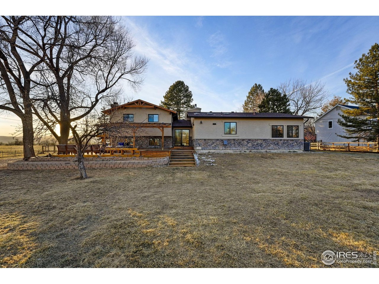 12212 Cash Road Longmont, CO 80503 - Photo 36 of 47 a view of a house with a yard