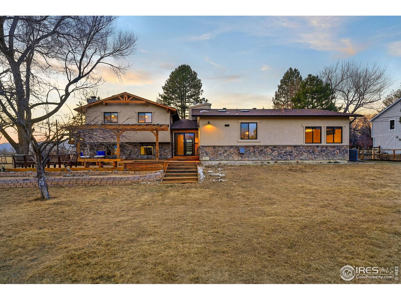 12212 Cash Road Longmont, CO 80503 - Photo 42 of 47 a front view of a house with a yard