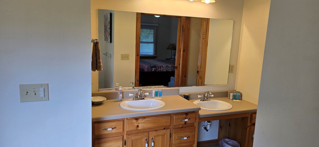 376 Crestview Drive Morganton, GA 30560 - Photo 11 of 37 a bathroom with a sink and a mirror