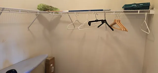 a view of a room with racks on the wall