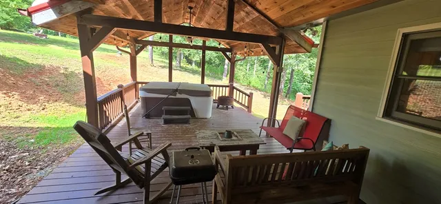a outdoor dining space with furniture and outdoor view