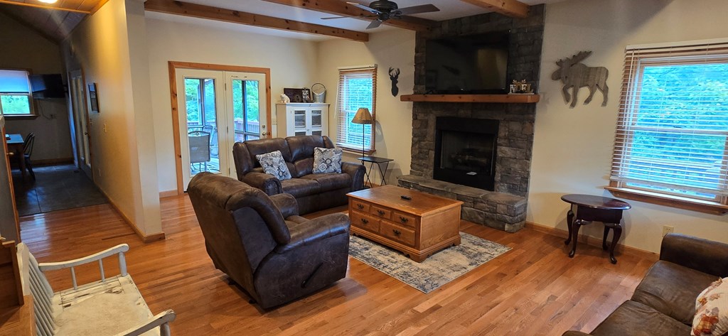 376 Crestview Drive Morganton, GA 30560 - Photo 6 of 37 a living room with furniture and a fireplace
