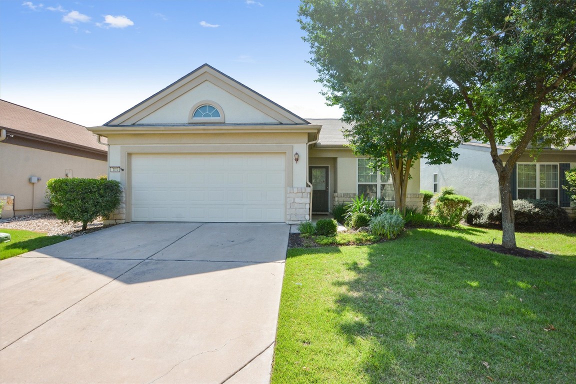 104 Winter Drive Georgetown, TX 78633 - Photo 1 of 1 a front view of a house with garden