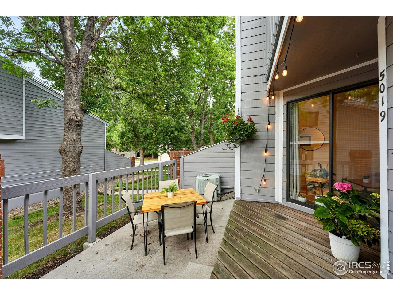5016 Buckingham Road, Unit 4 Boulder, CO 80301 - Photo 2 of 22 a view of a chair and table in the balcony