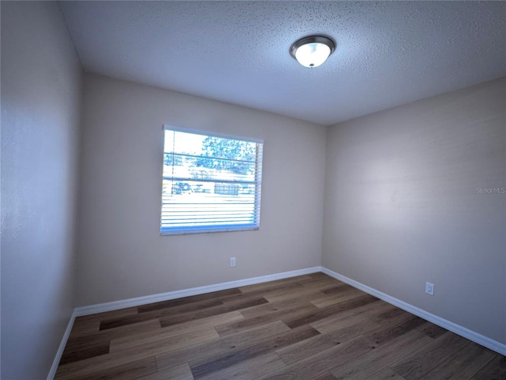 2527 Ridge Top Way Valrico, FL 33594 - Photo 18 of 31 an empty room with a window