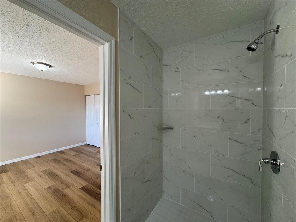 2527 Ridge Top Way Valrico, FL 33594 - Photo 25 of 31 a bathroom with a shower