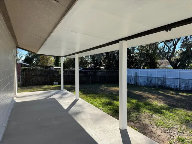 a view of backyard with green space