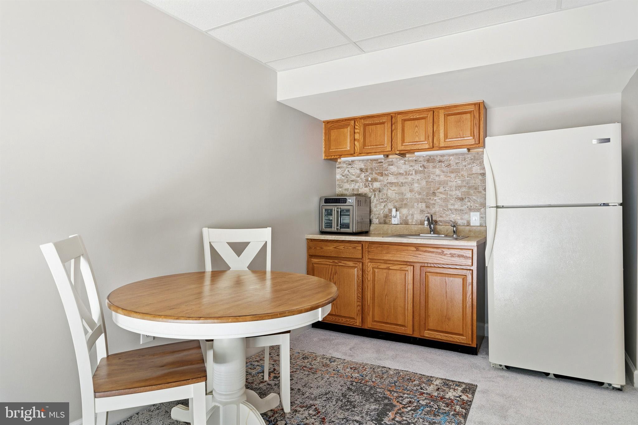 3148 Holland Cliffs Road Huntingtown, MD 20639 - Photo 34 of 61 Convenient lower-level kitchenette.