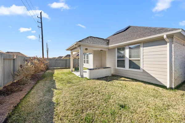 a house view with a outdoor space