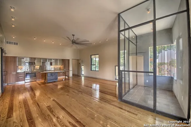 a view of a living room filled with furniture