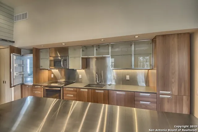 a view of a living room with furniture