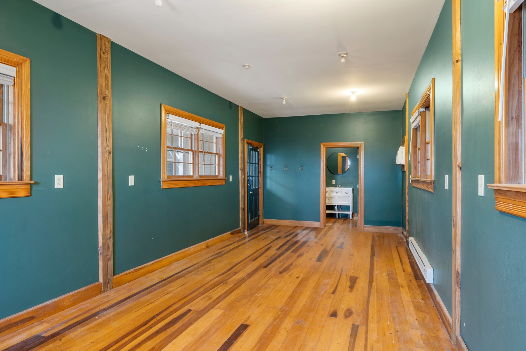 2600 Charlie Thomas Road Cornersville, TN 37047 - Photo 27 of 35 a view of an empty room with window and hardwood
