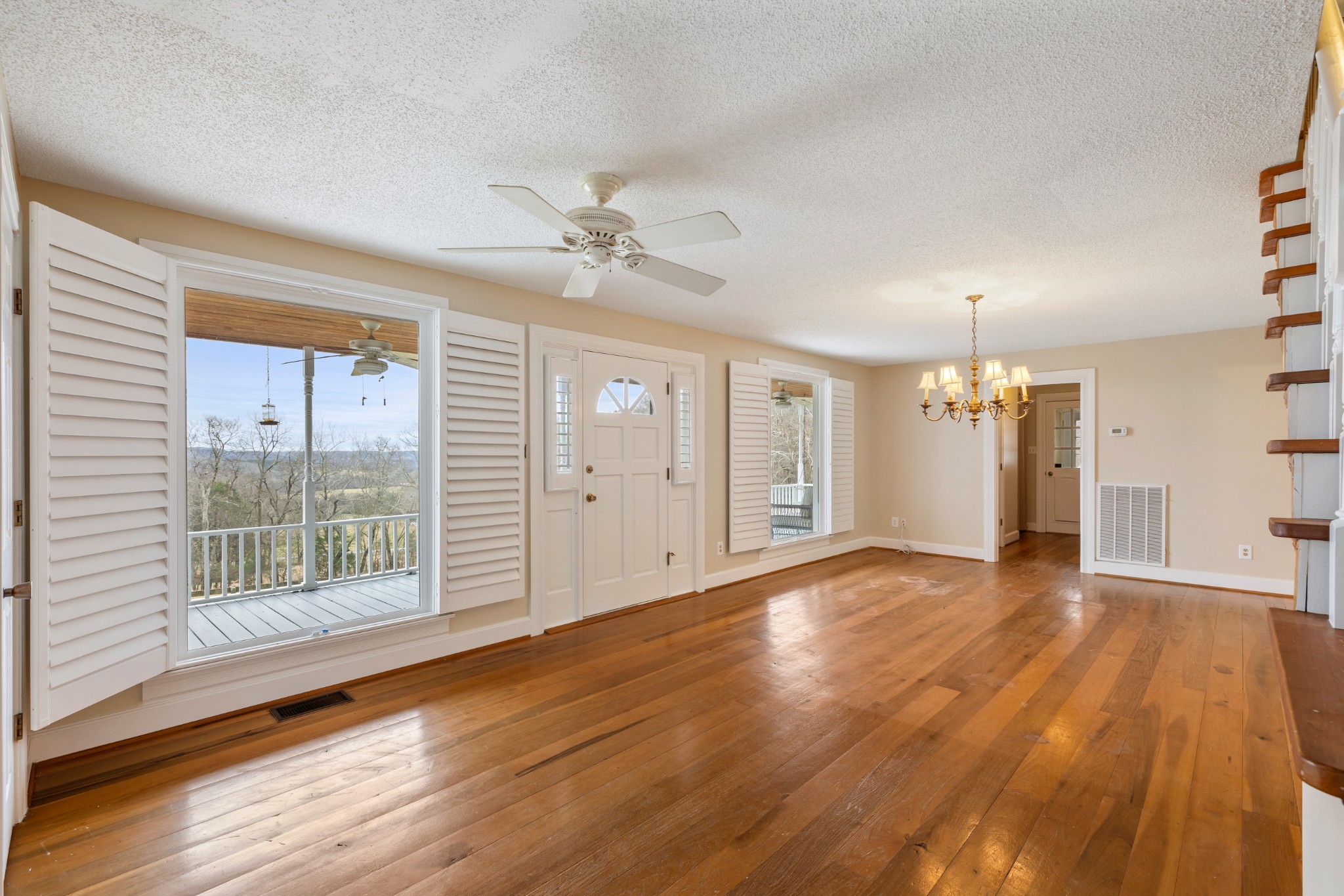 2600 Charlie Thomas Road Cornersville, TN 37047 - Photo 10 of 35 a view of empty room with wooden floor and fan