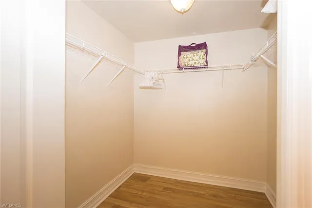 a view of small space with empty racks on the wall