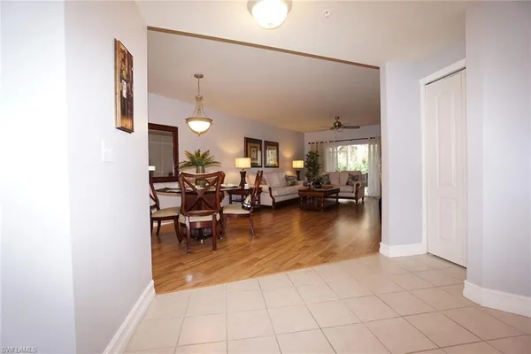 a view of a living room and dining room