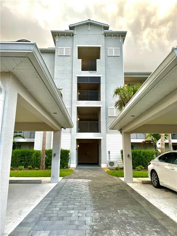 a view of a car in front of a house