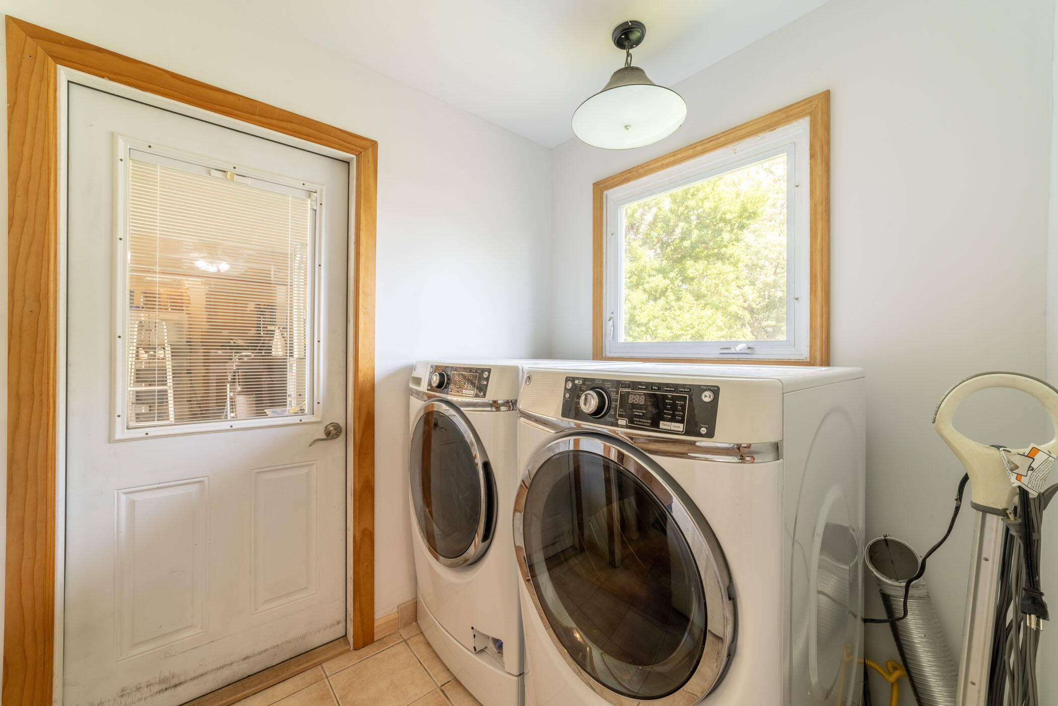 631 Osage Road Valparaiso, IN 46385 - Photo 11 of 14 a view of a bedroom with washer and dryer