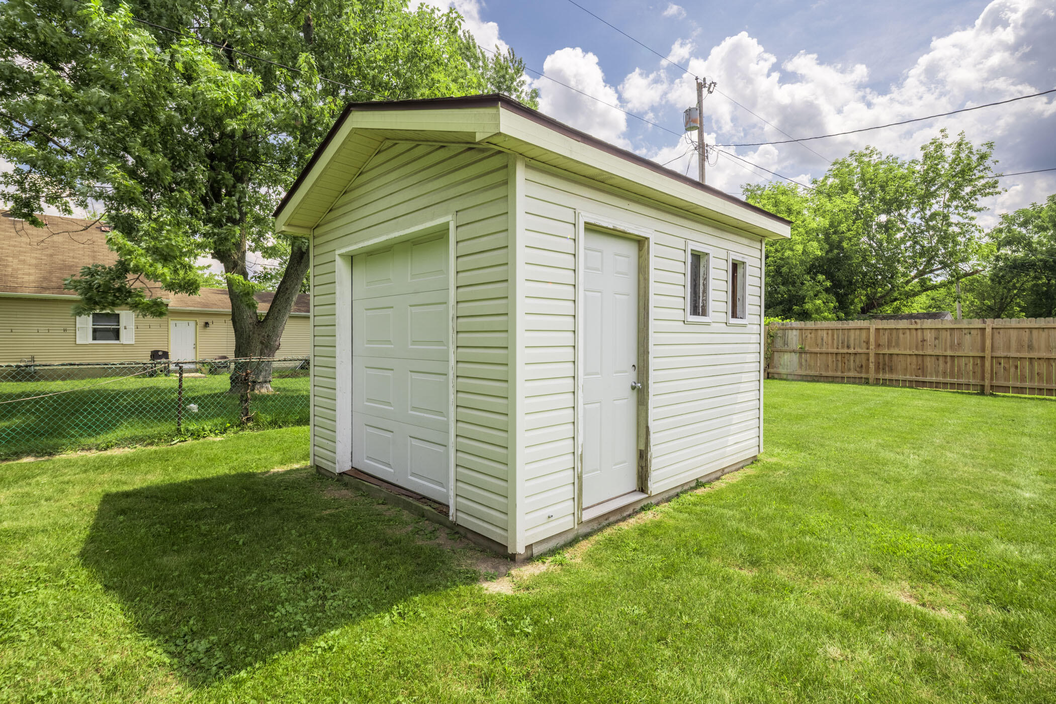 631 Osage Road Valparaiso, IN 46385 - Photo 13 of 14 a view of a backyard with a garden