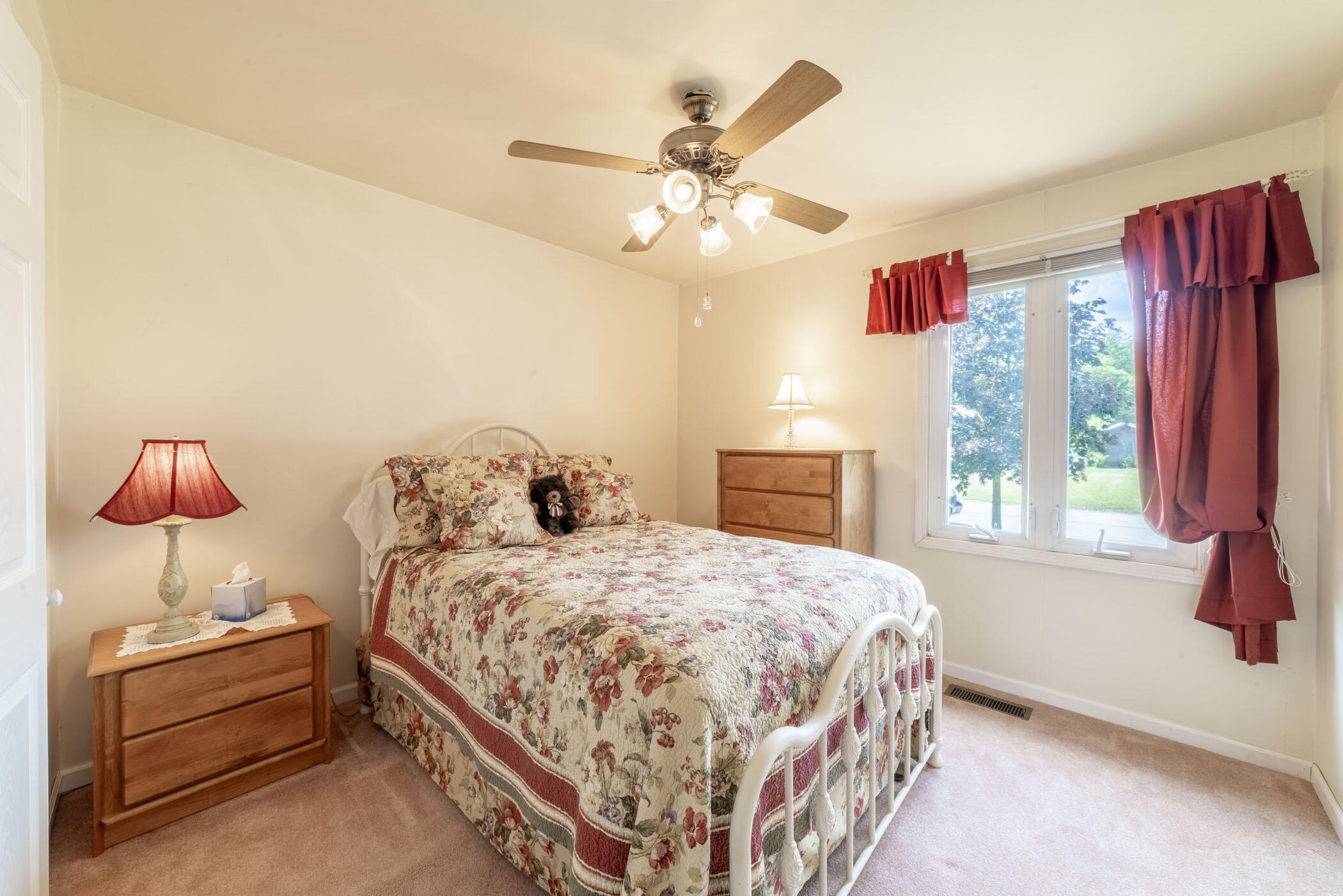 631 Osage Road Valparaiso, IN 46385 - Photo 7 of 14 a bedroom with a bed and window