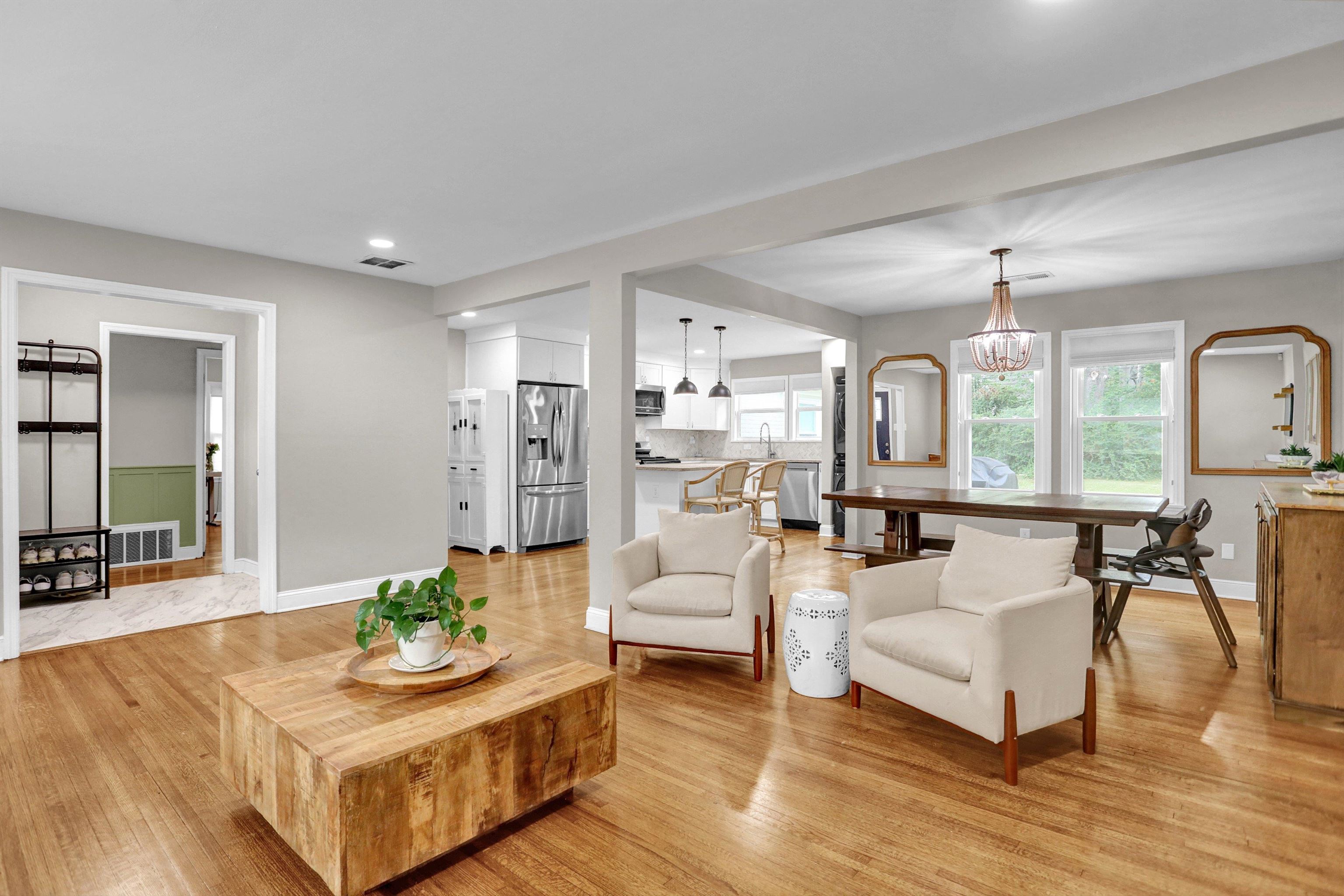 a living room with furniture and a table