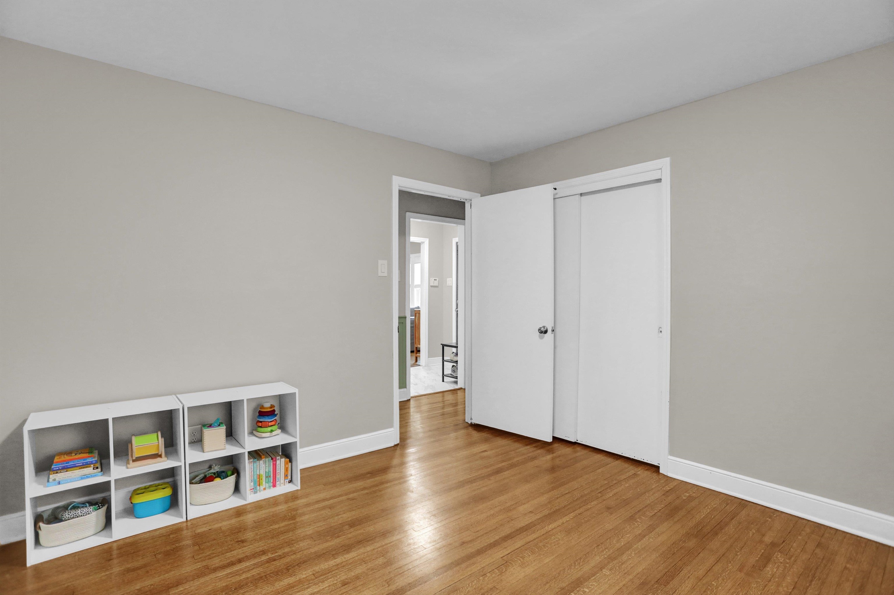 4344 Rhodes Avenue Memphis, TN 38111 - Photo 24 of 31 a view of room with furniture and wooden floor