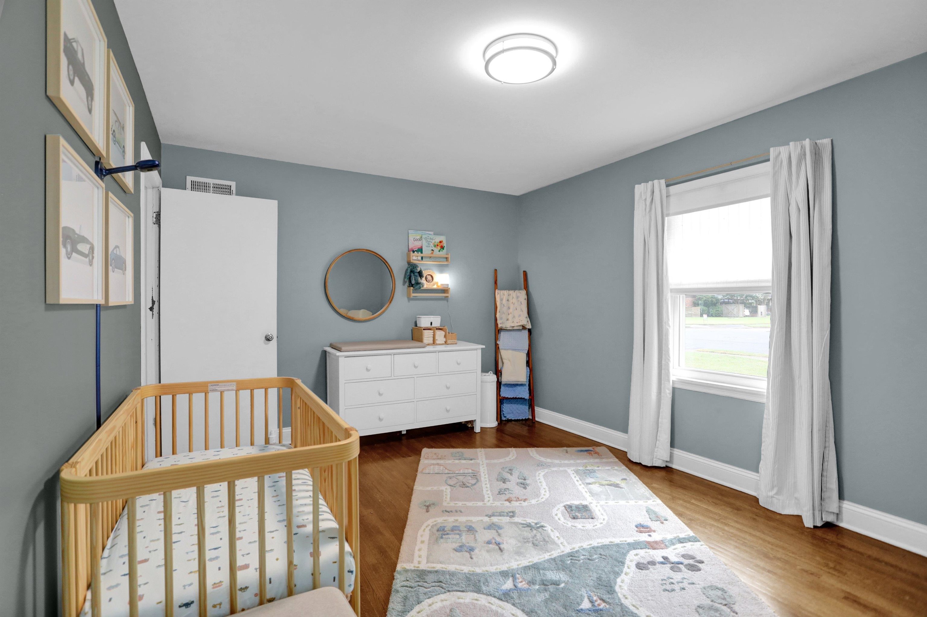 4344 Rhodes Avenue Memphis, TN 38111 - Photo 26 of 31 a bedroom with a bed and a window